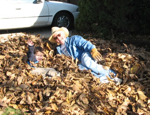If you're four, you can jump into a HUGE pile of leaves, walnuts and all.